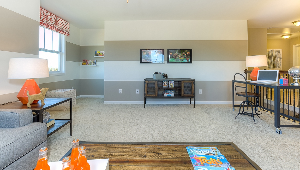 Upstairs Recreational room with carpet and two small windows