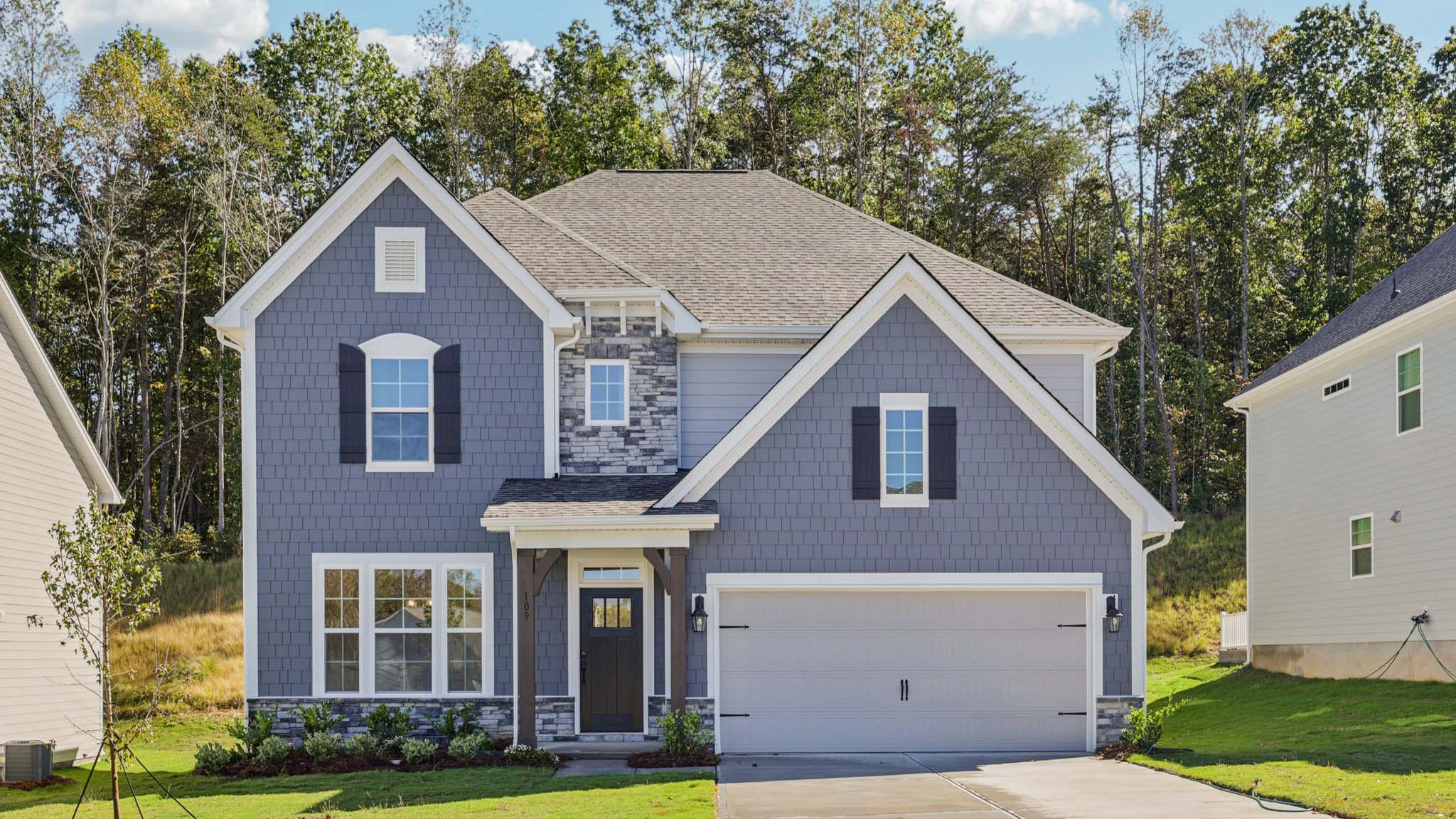 Hampshire front exterior with siding and two car garage