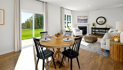 Open dining area with view of family room