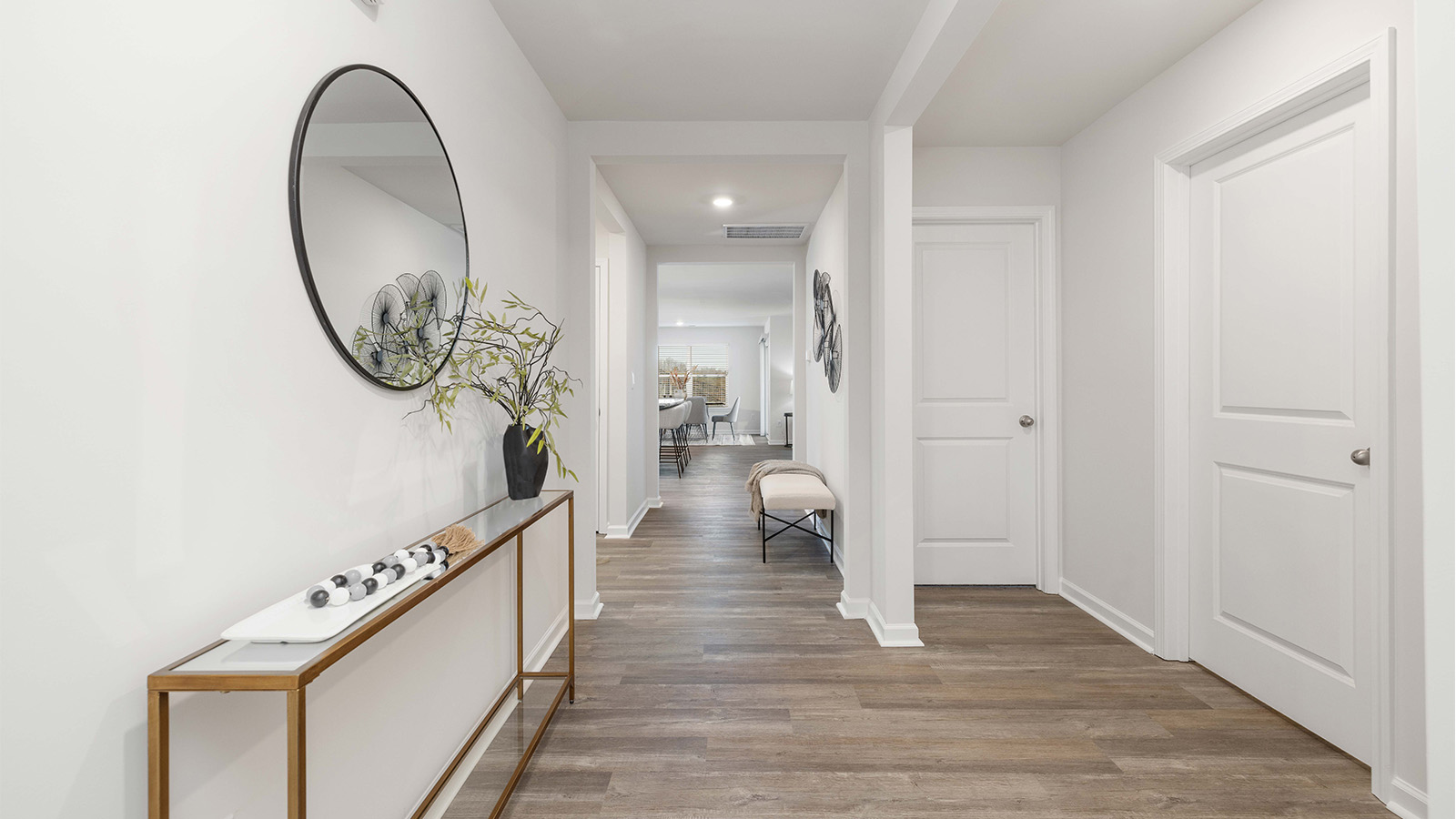 Welcoming foyer with vinyl flooring, view of interior. New Home in Charlotte, North Carolina