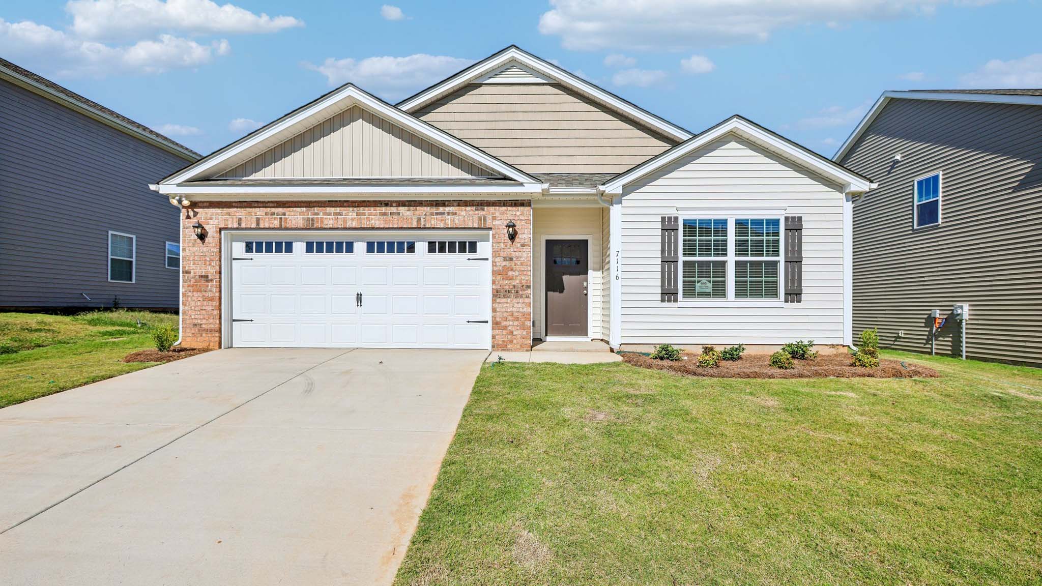 Cali front exterior rendering with siding and two car garage