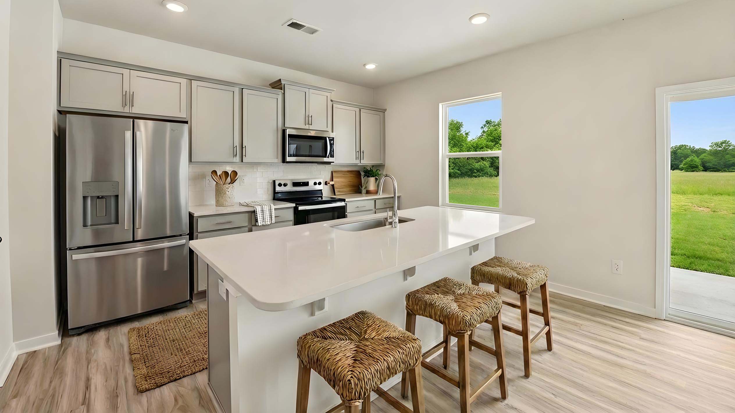 kitchen and island with stainless steel appliance