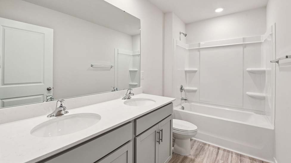 Bathroom with bathtub shower combo