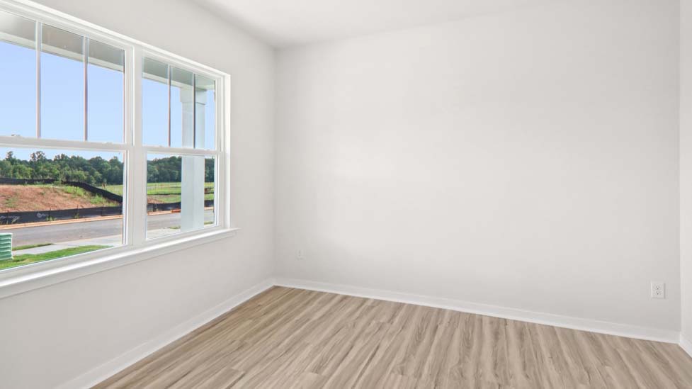 Dining area with large window and french doors