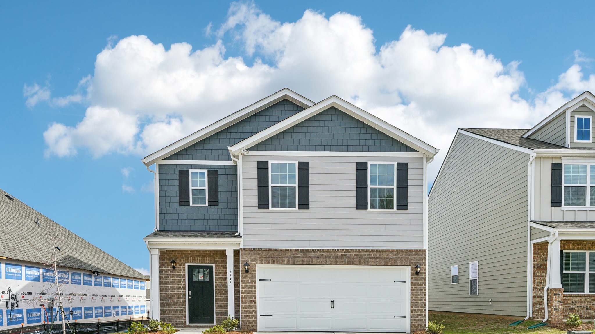Robie F front exterior rendering with siding and two car garage