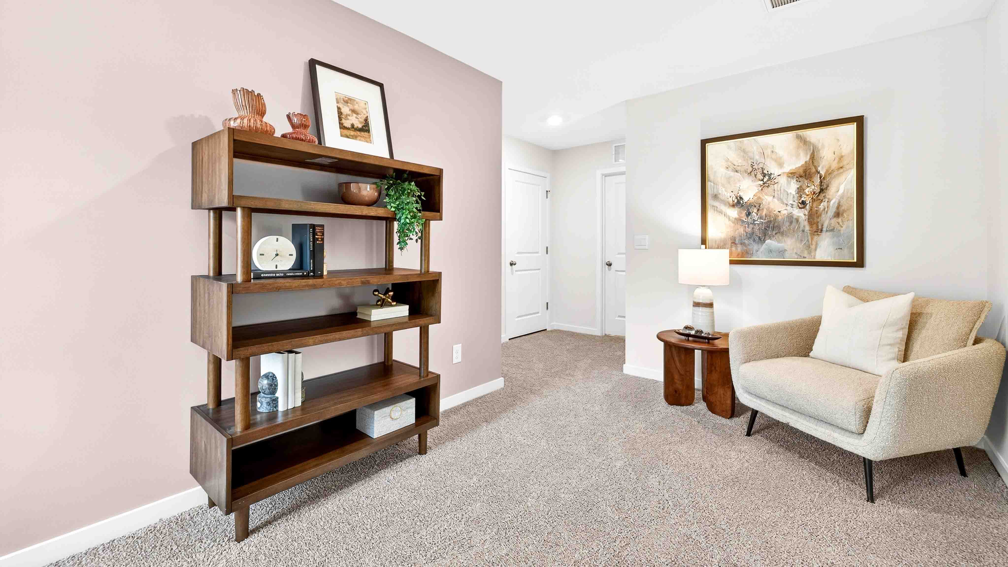 Open flex space, carpeted with large window