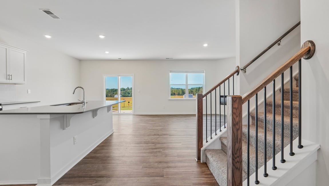 Living room with windows and electric fireplace