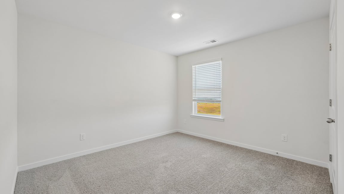 Primary bedroom with windows