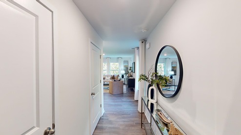 Welcoming foyer with view of home interior