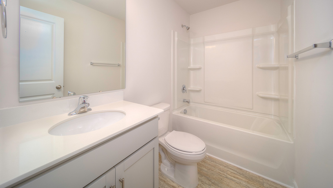 Bathroom with bathtub and shower combination
