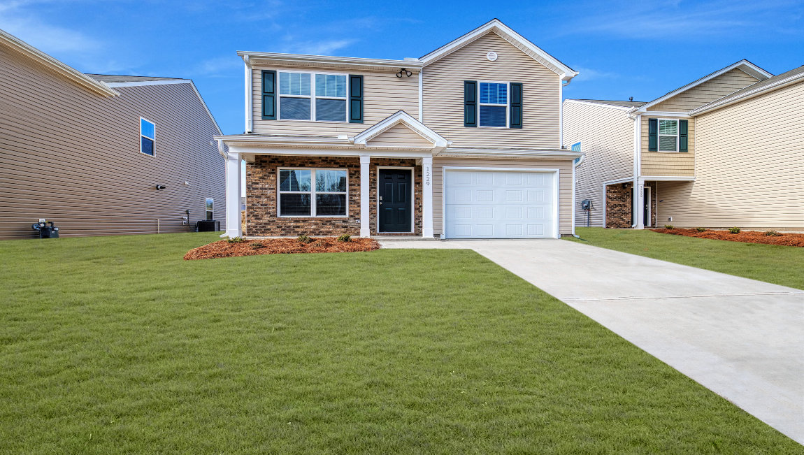 Brandon front exterior with Beige  siding and garage