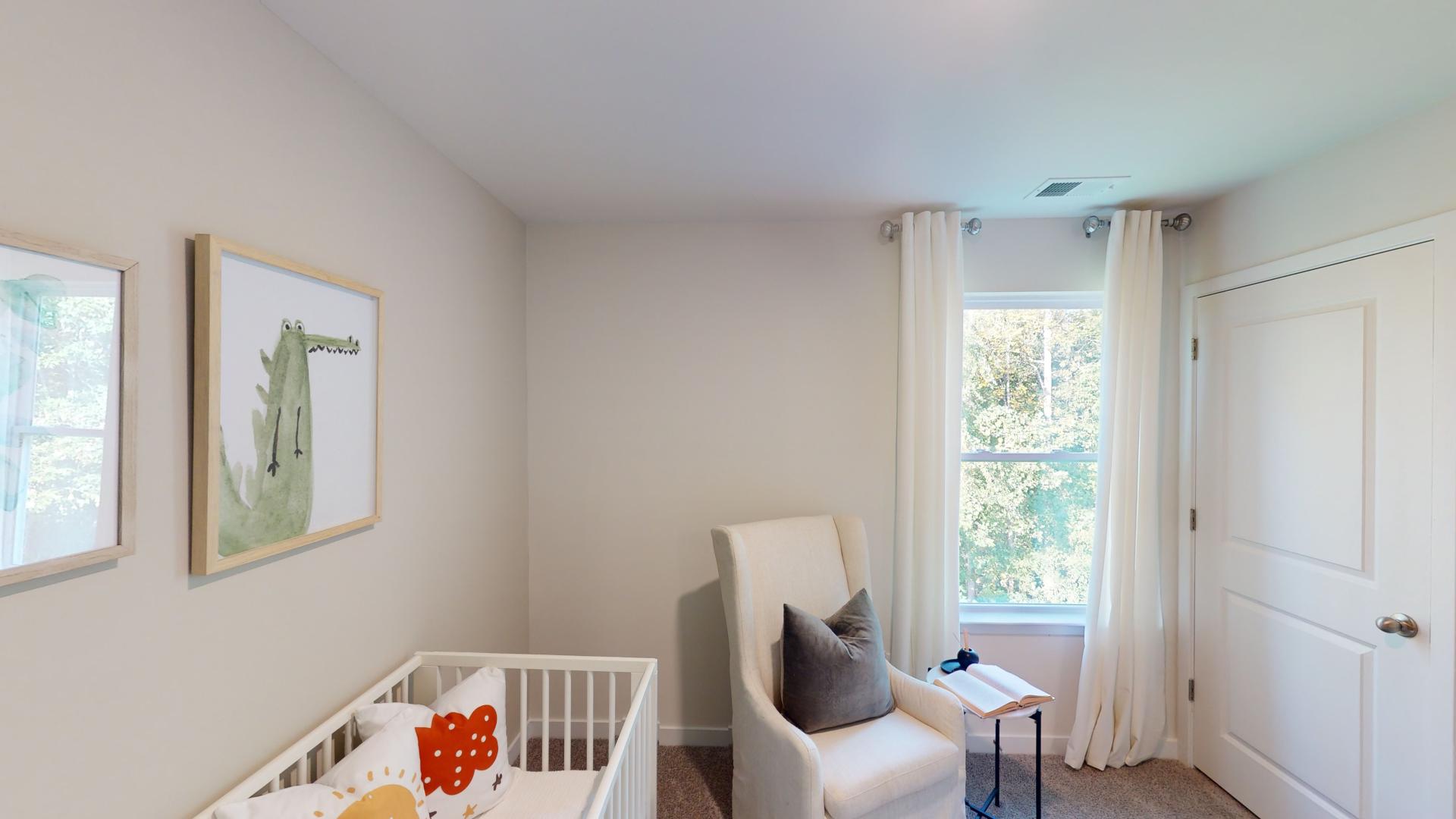 Carpeted bedroom with small windows