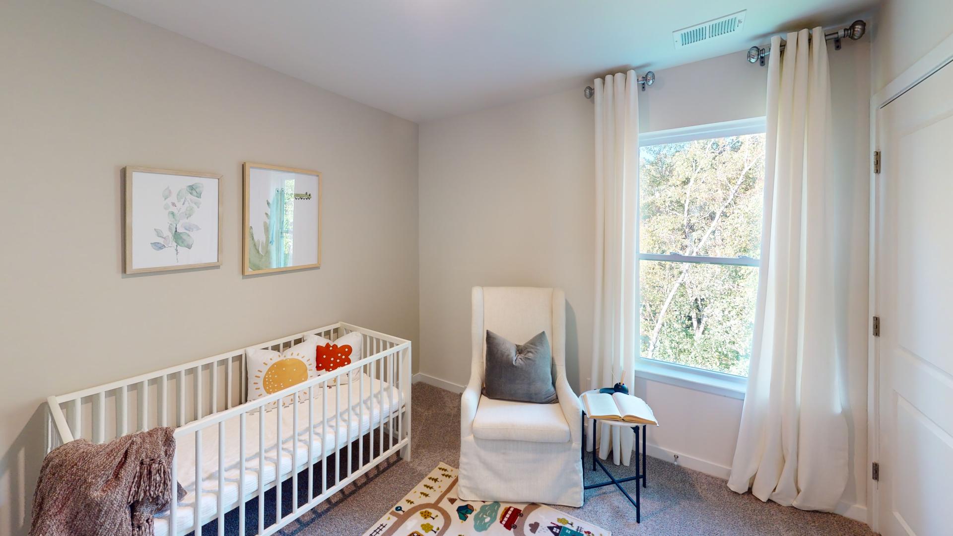 Carpeted bedroom with small windows