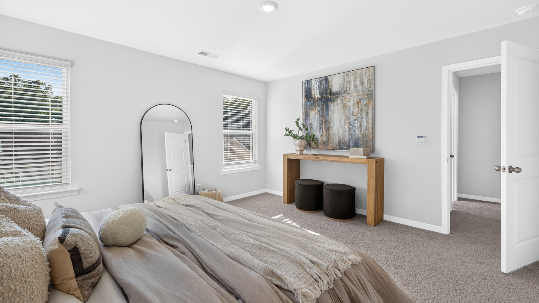 Primary bedroom with windows