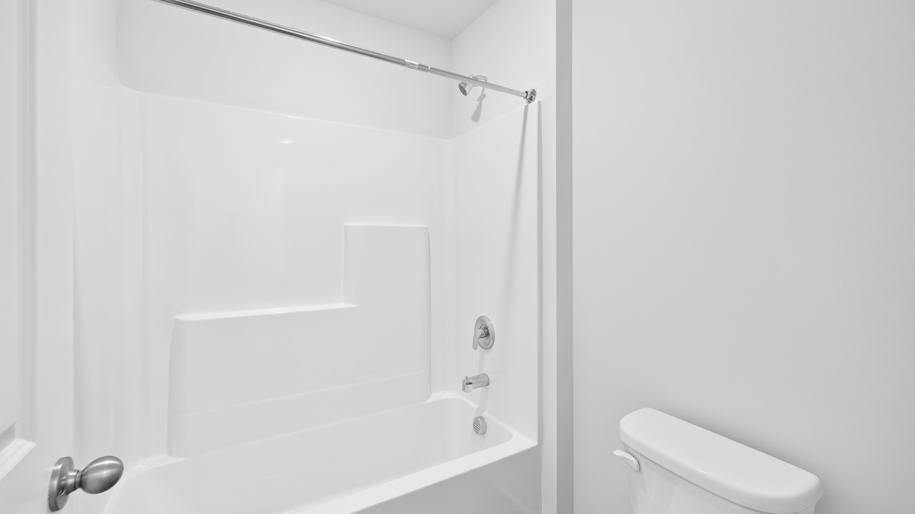 Bathroom with double sinks and tub shower