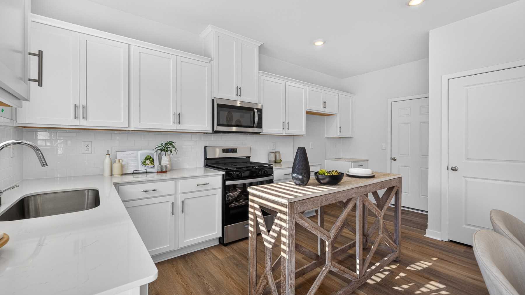Kitchen with white cabinets