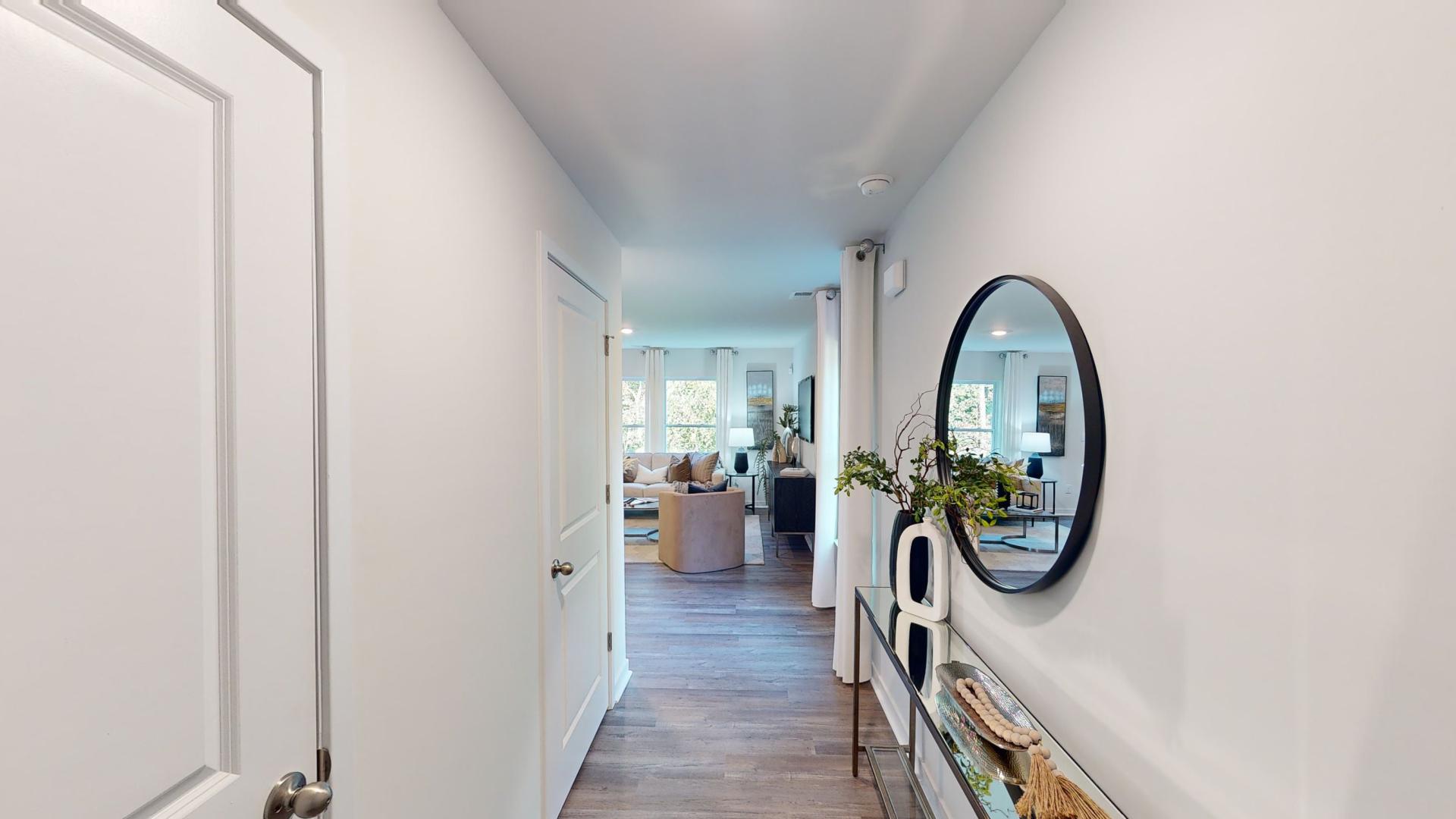 Welcoming foyer, view of staircase and front door