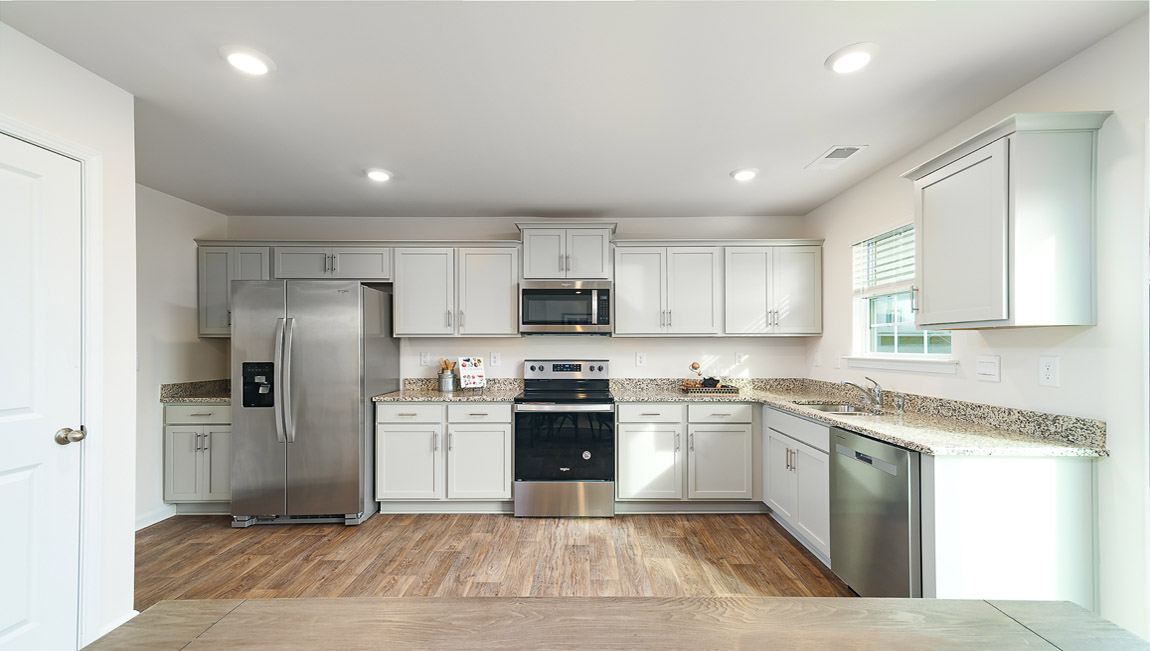 Kitchen with white cabinets