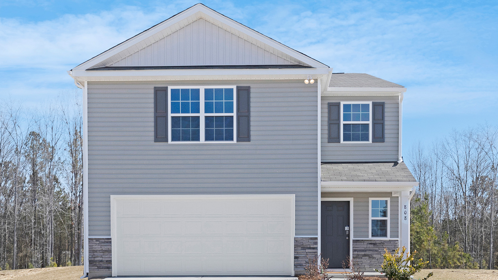Darwin front exterior with stone and siding and two car garage