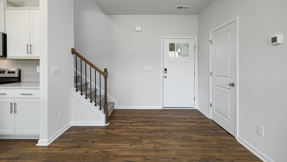 Welcoming foyer with view of staircase