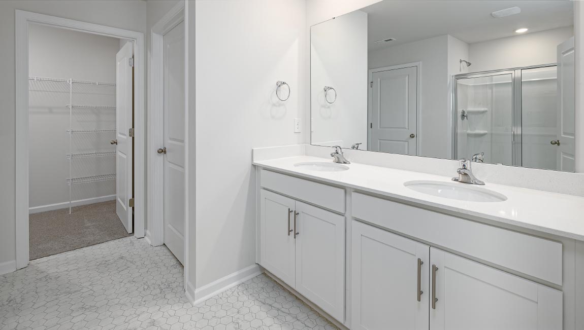 Primary bathroom with glass door shower