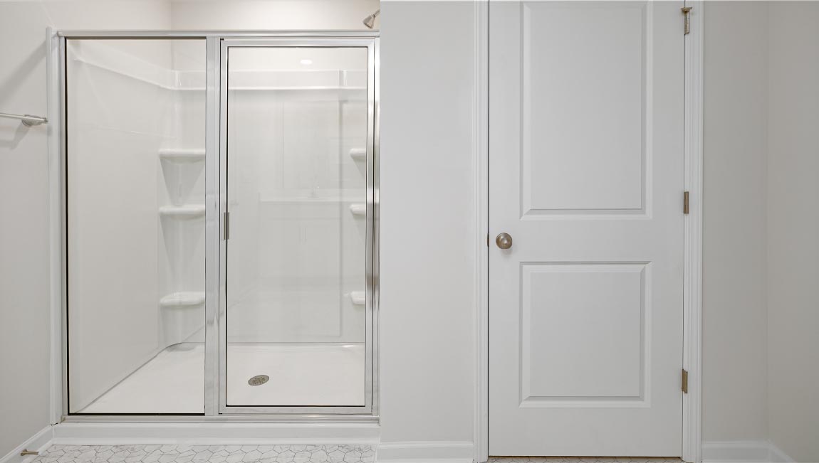 Primary bathroom with glass door shower