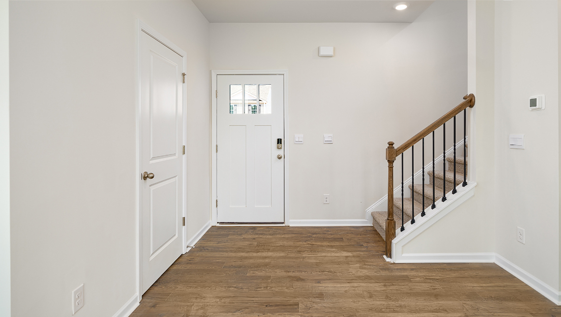 Welcoming foyer with view of staircase