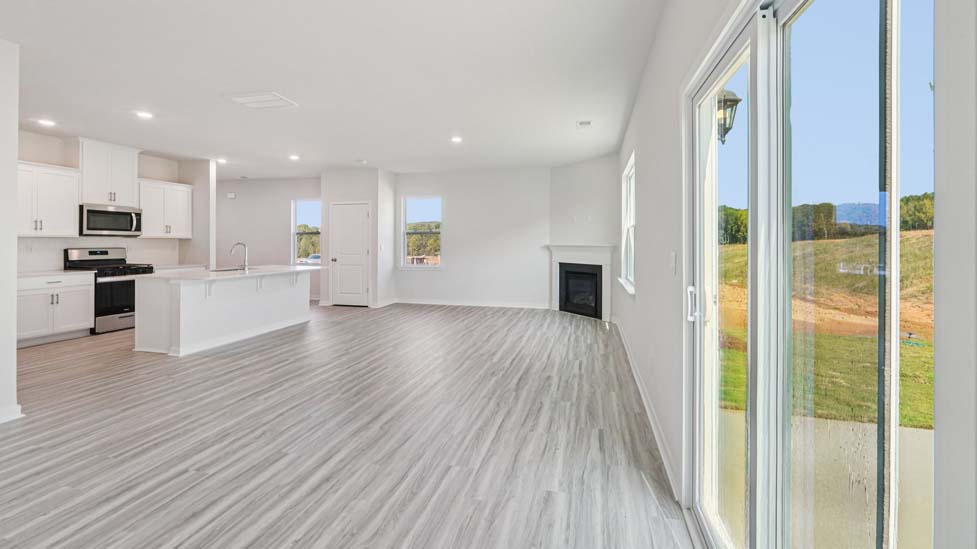 Dining area with wood floor and sliding glass door