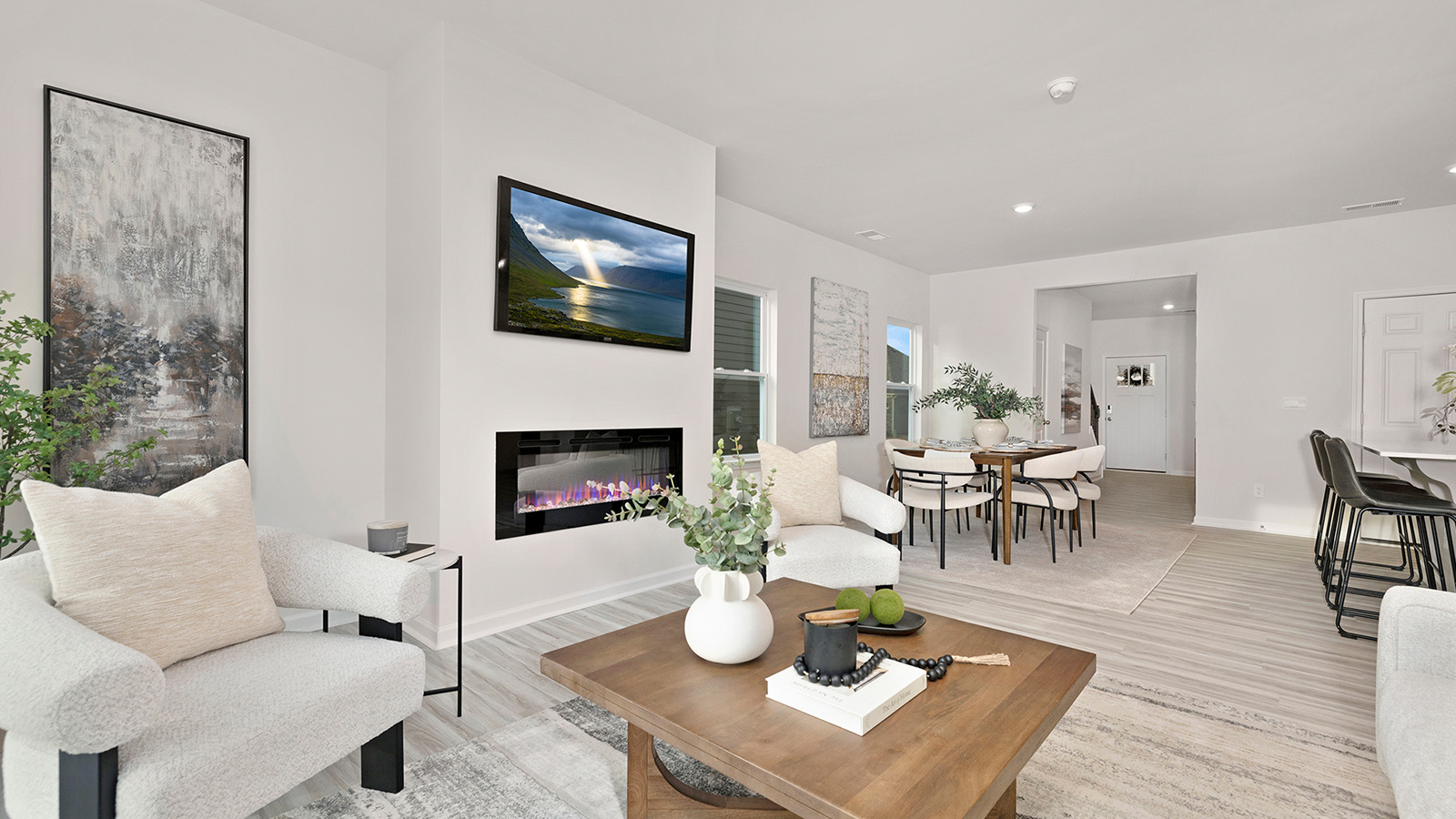 Family room with fireplace and large window