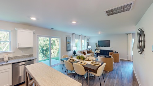 Kitchen and dining area with sliding glass back door