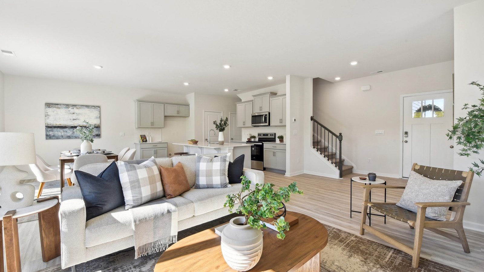 Spacious family room with large windows and fireplace