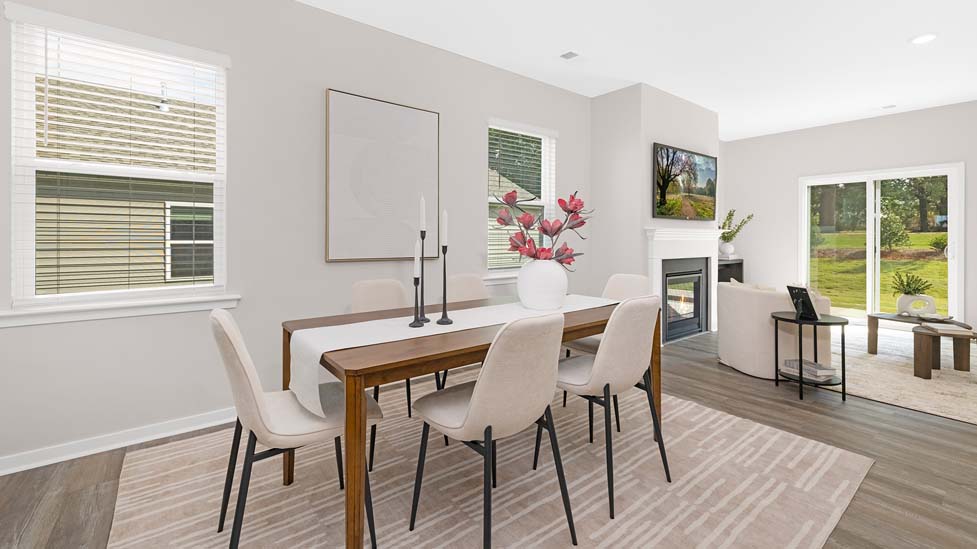 Family room with fireplace and large window