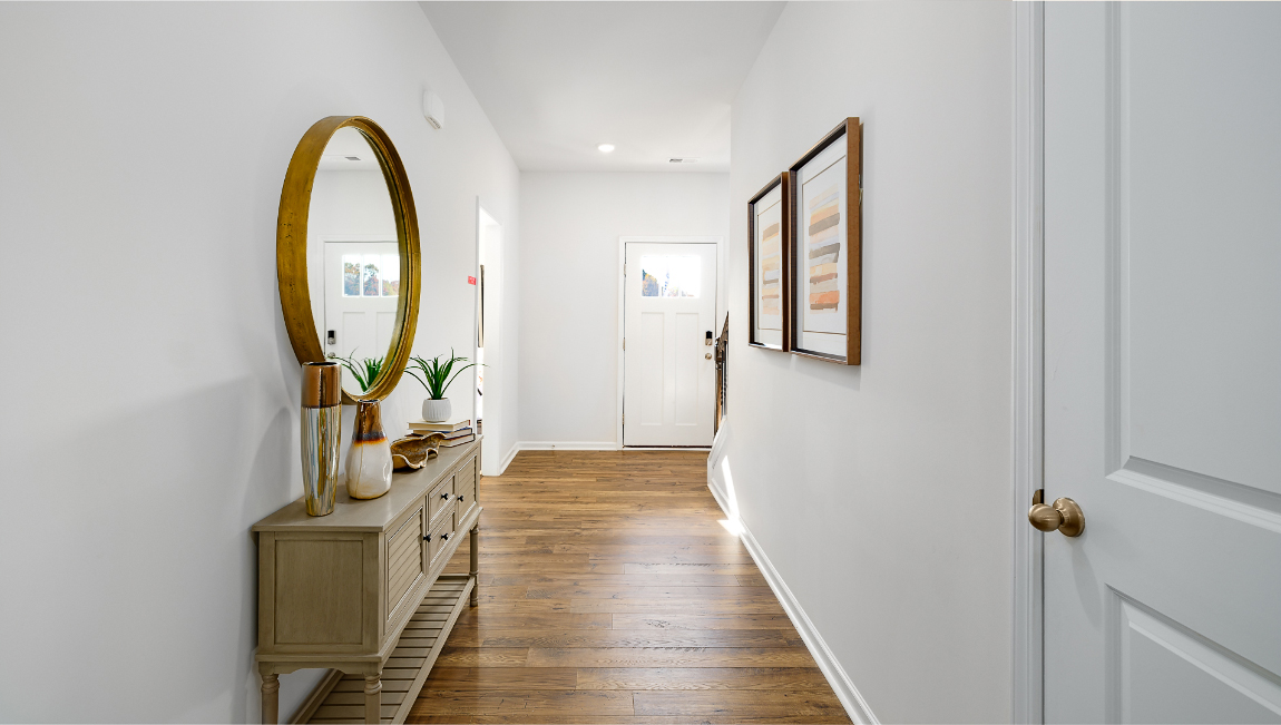 Welcoming foyer view of staircase