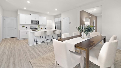 Breakfast/dining area beside kitchen and living room