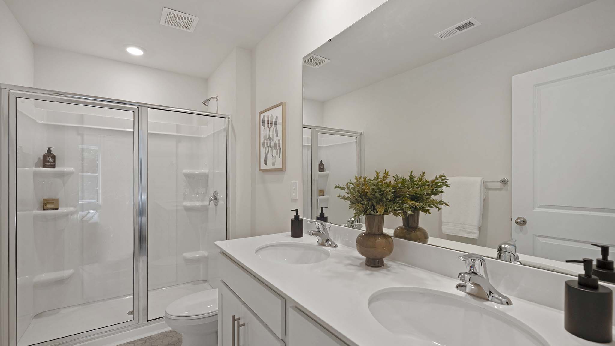 Bathroom with standing glass shower