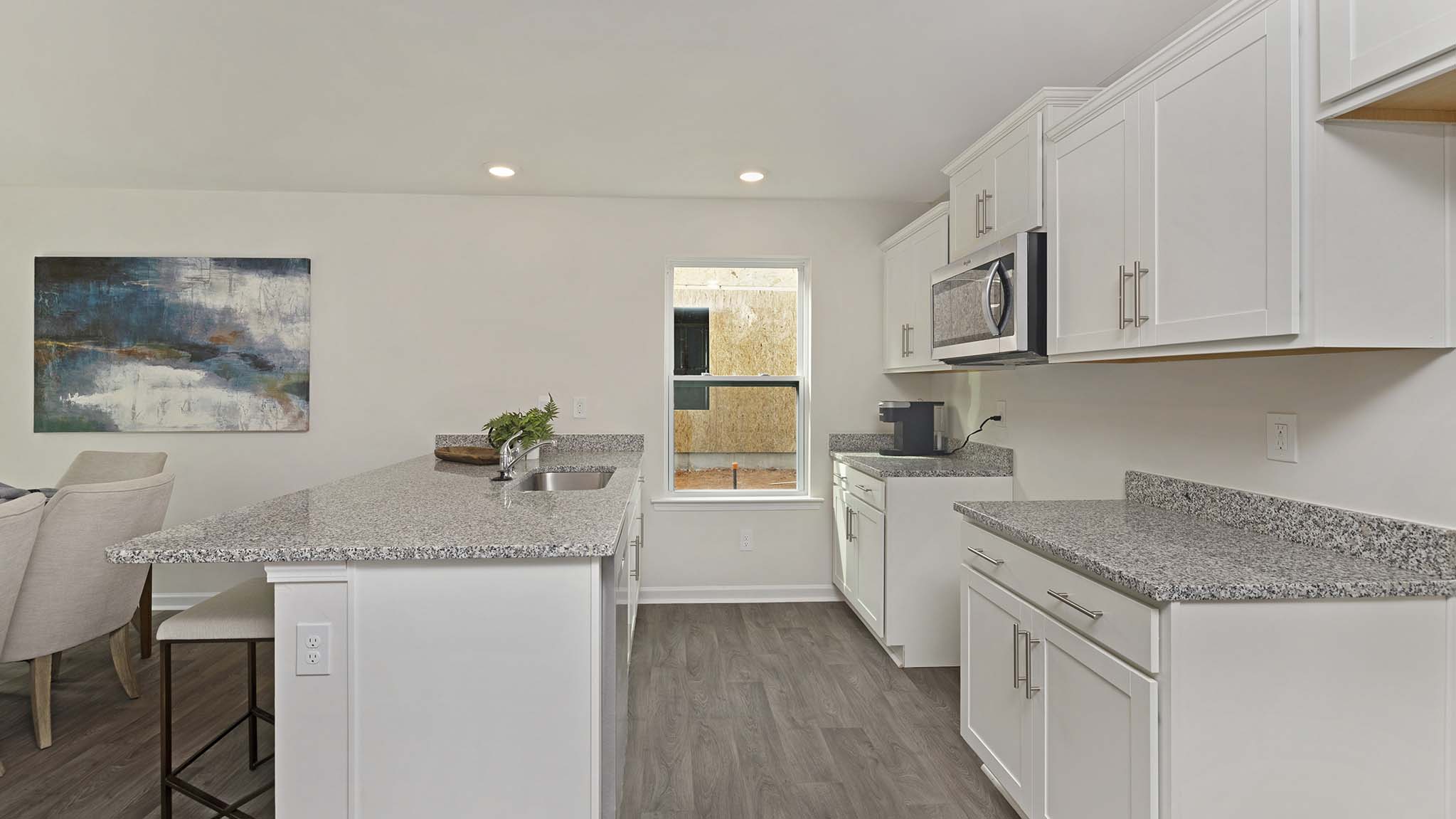 Kitchen and Island with stainless steel appliances