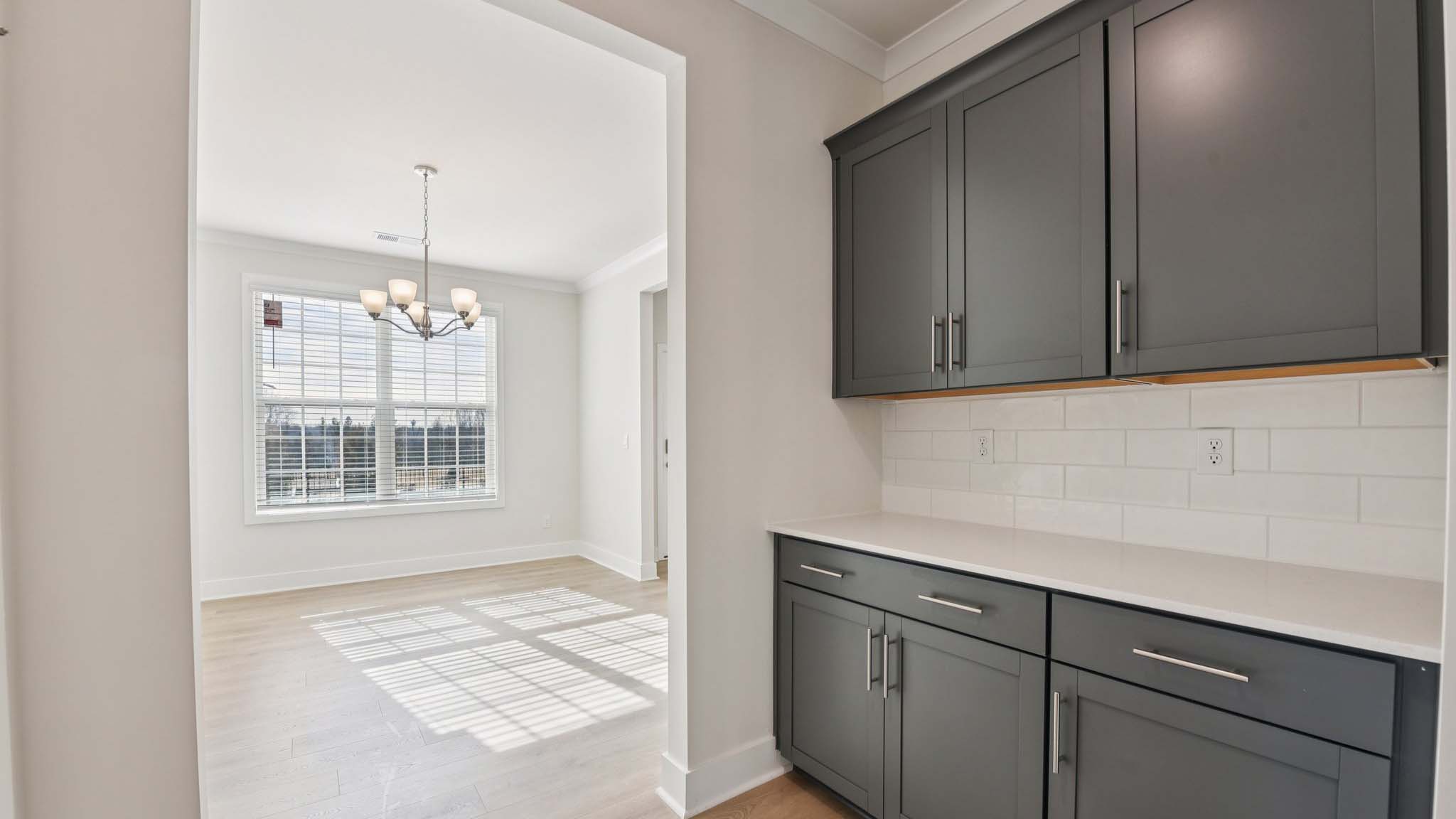 Kitchen and island with quartz countertops