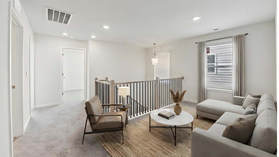 Upstairs loft area with view of stairs