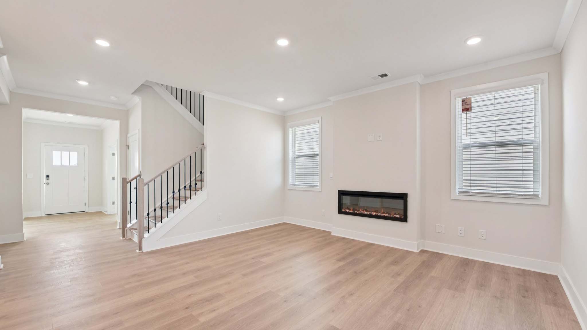 Living room with fireplace and windows