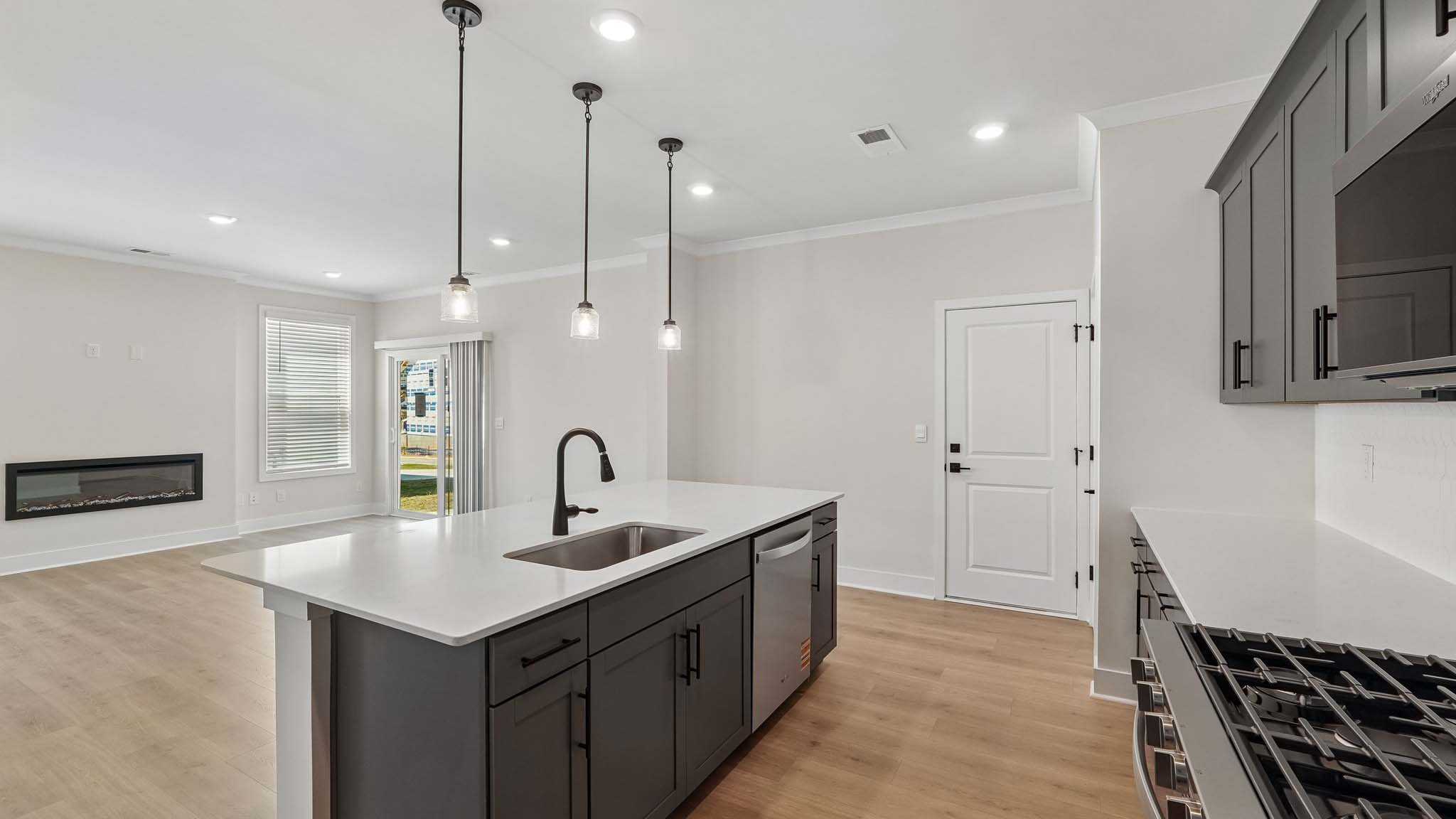 Kitchen and island with quartz countertops