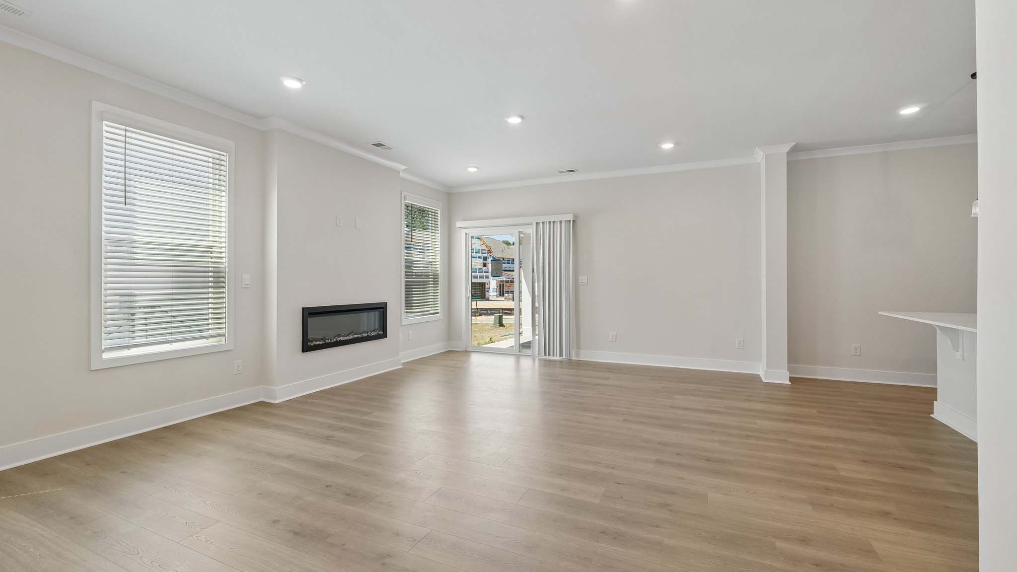 Living room with fireplace and windows