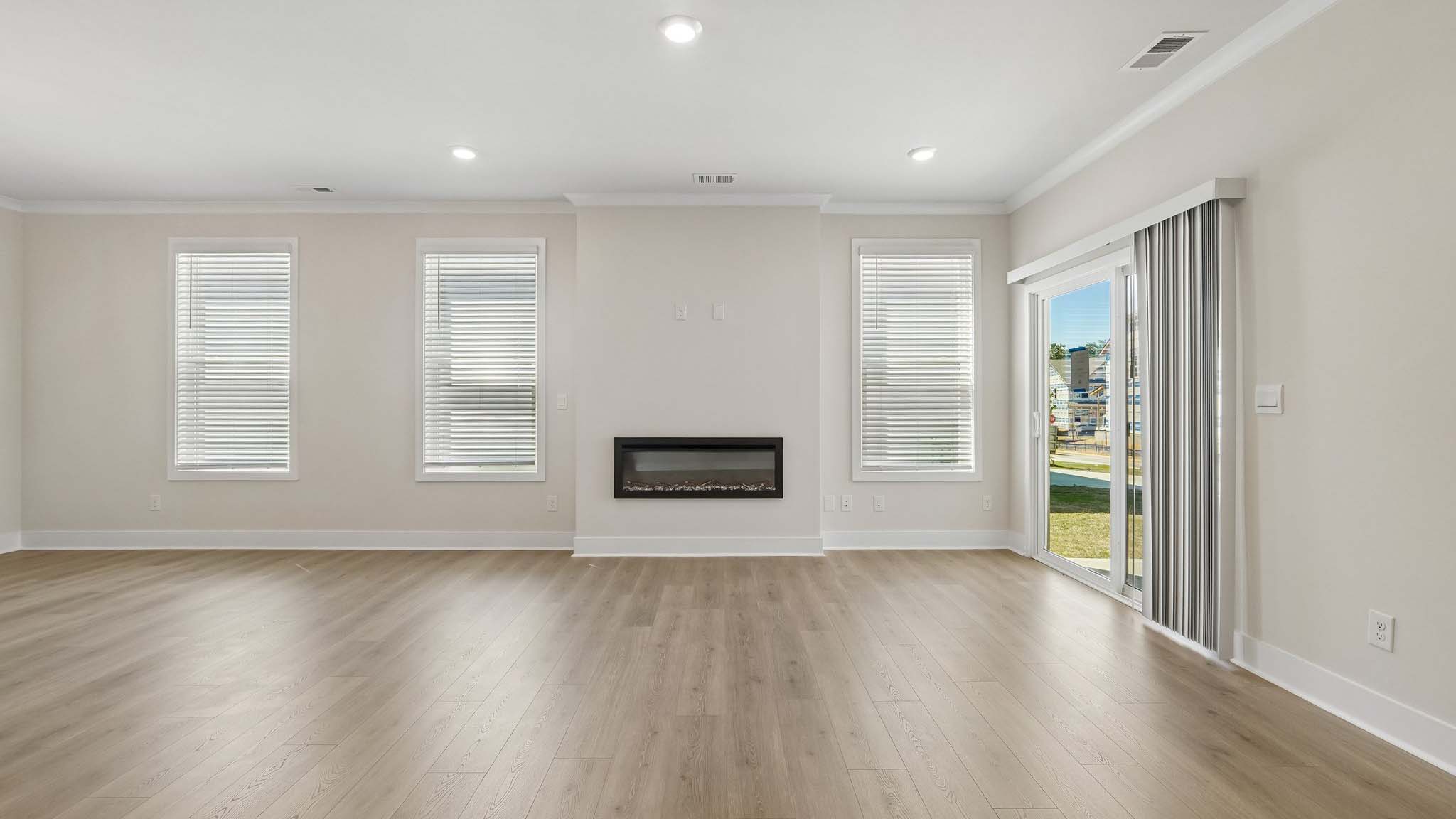 Living room with fireplace and windows