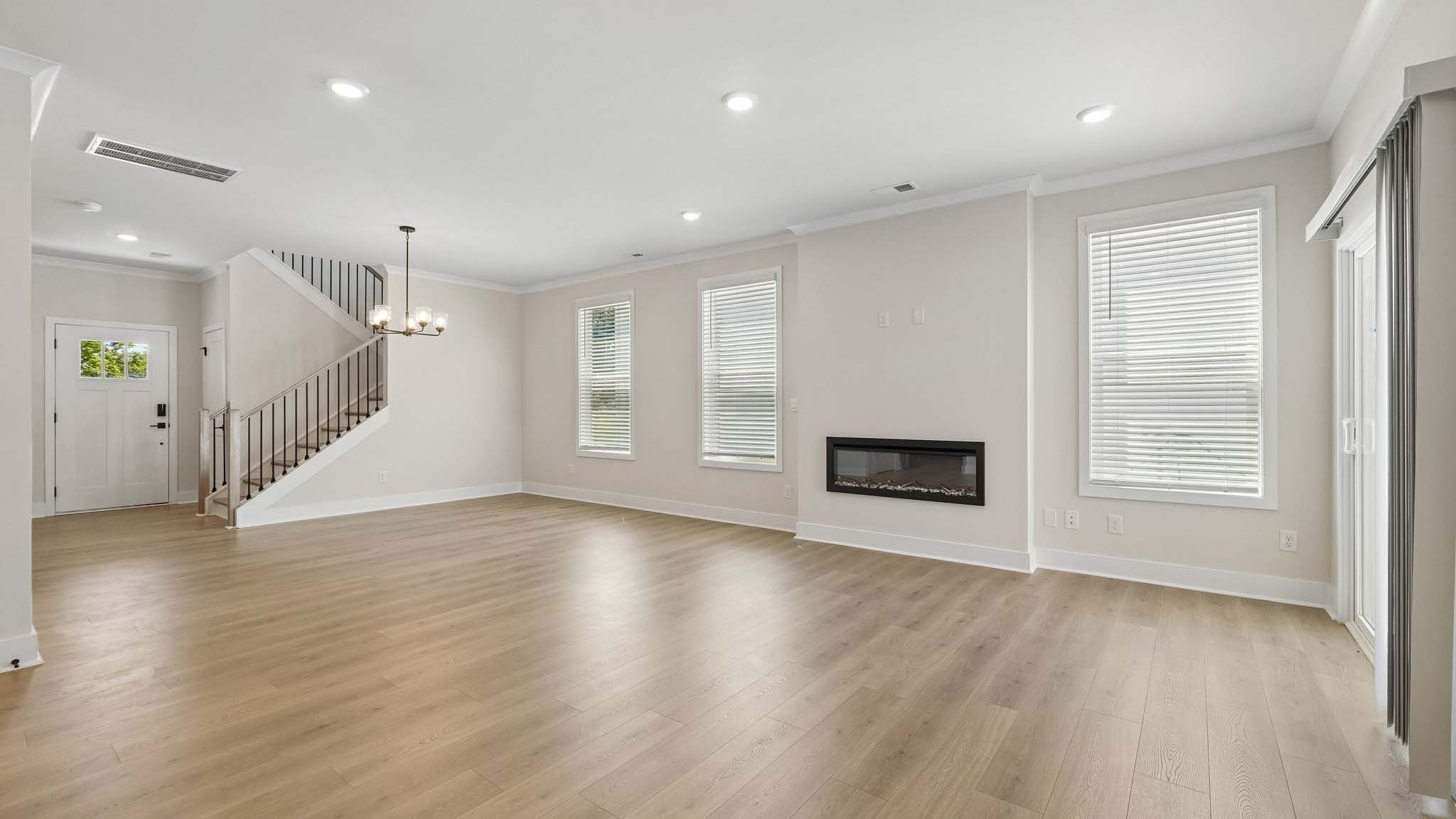 Living room with fireplace and windows
