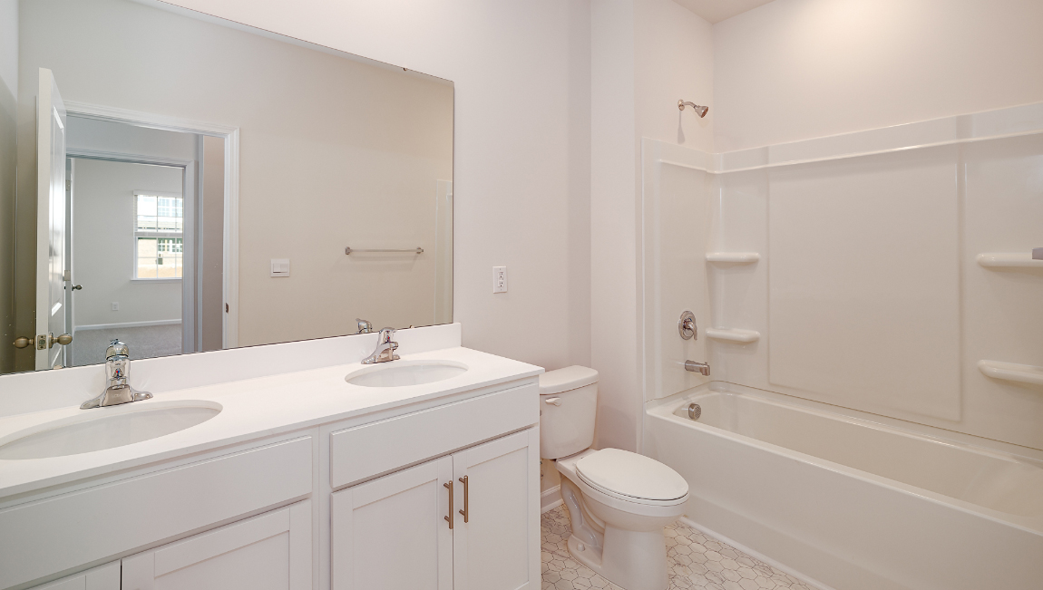 Bathroom with bathtub and shower combination