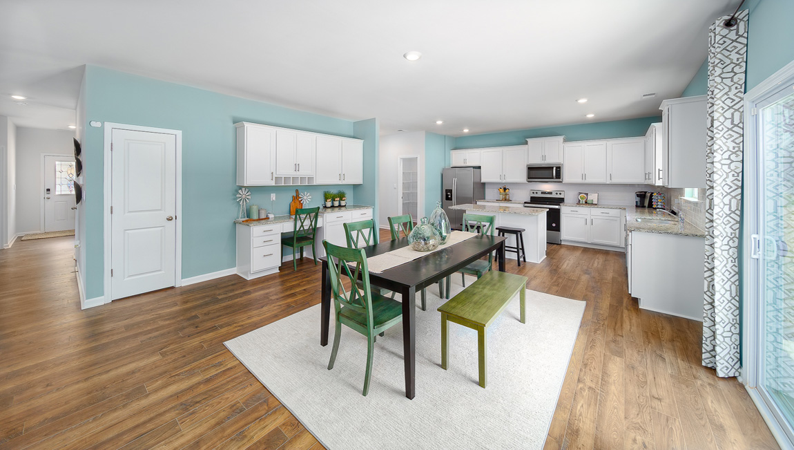 Breakfast area near kitchen, sliding glass doors to patio
