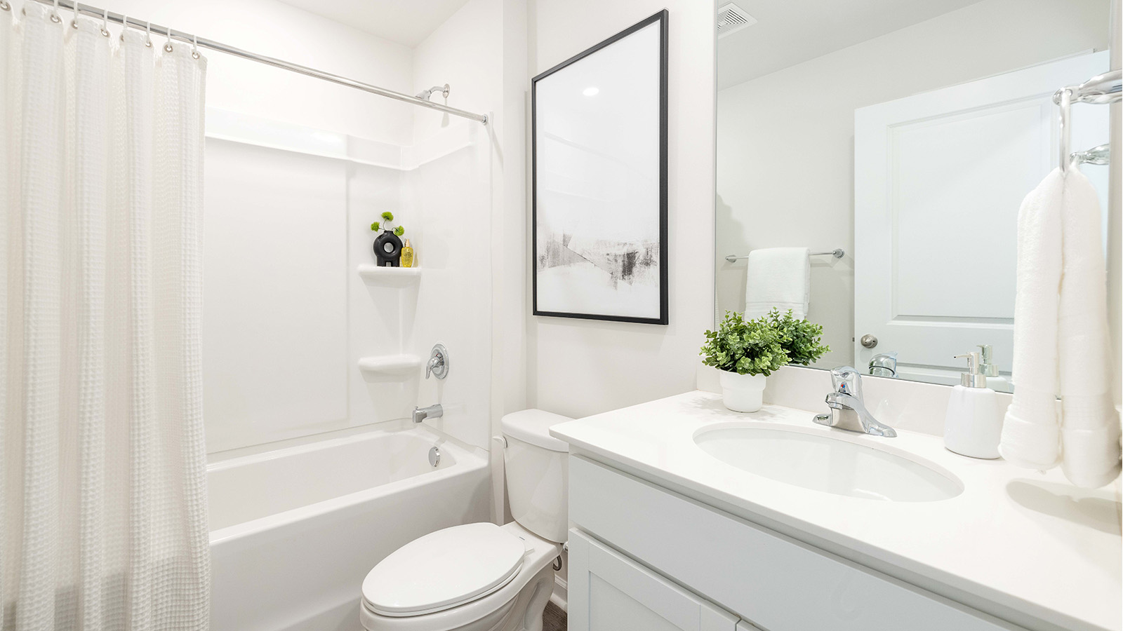 Single sink bathroom with tub shower