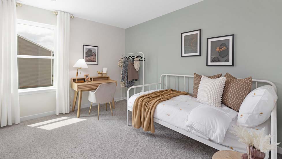 Carpeted bedroom with large window