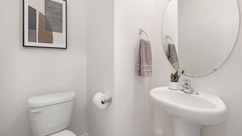 Powder bathroom with sink and toilet