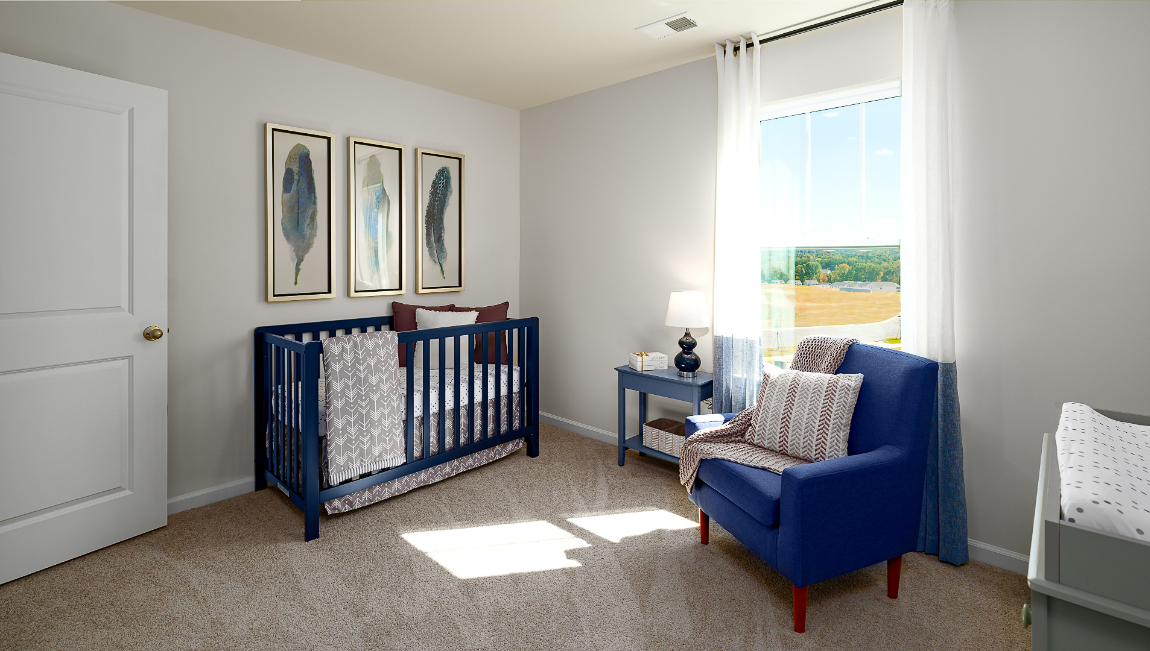 Carpeted bedroom with large windows
