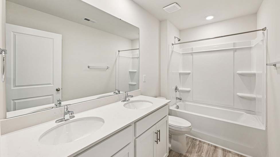 Bathroom with bathtub shower combo